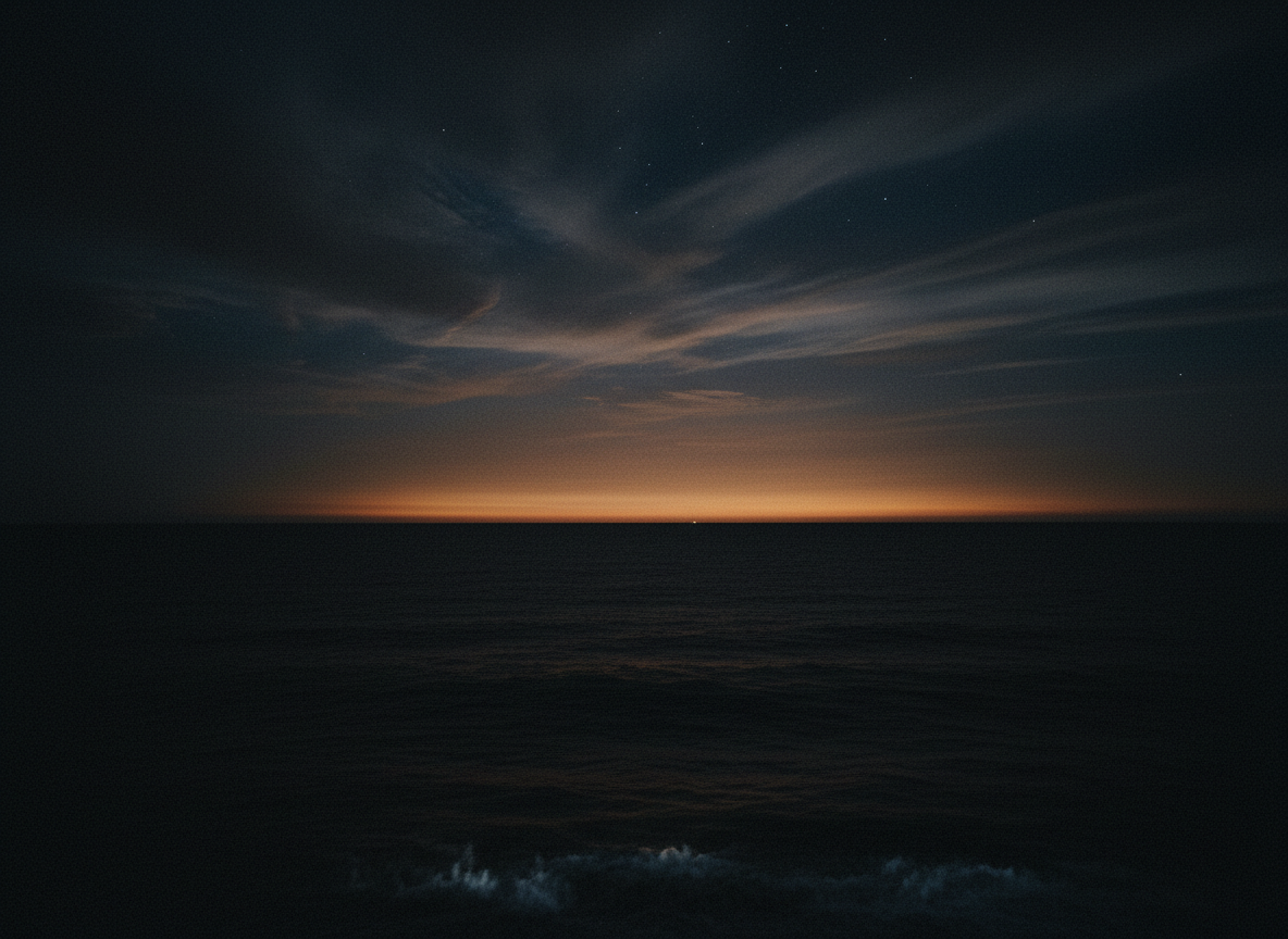 Dark moody minimalist ocean at night, near-black seascape with faint warm horizon glow